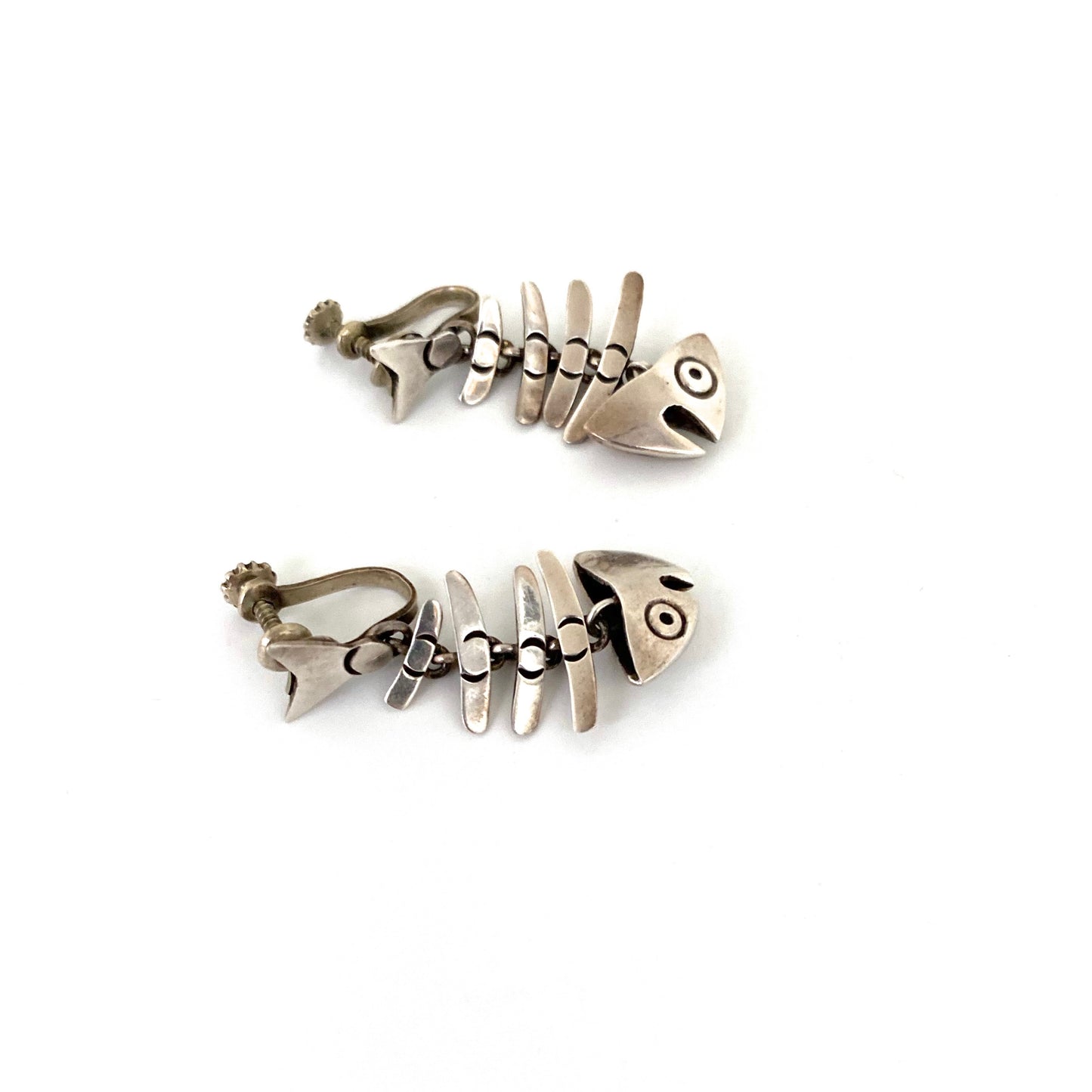 profile Taxco Mexico vintage kinetic silver fish skeleton earrings after Antonio Pineda design