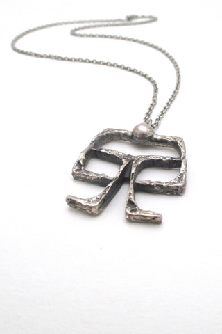 Guy Vidal Canada vintage brutalist pewter openwork on a swing pendant necklace