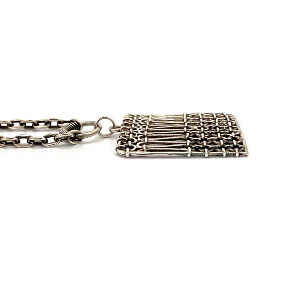 profile Pentti Sarpaneva Finland vintage silver openwork square pendant necklace 1974 Scandinavian Modernist jewelry design