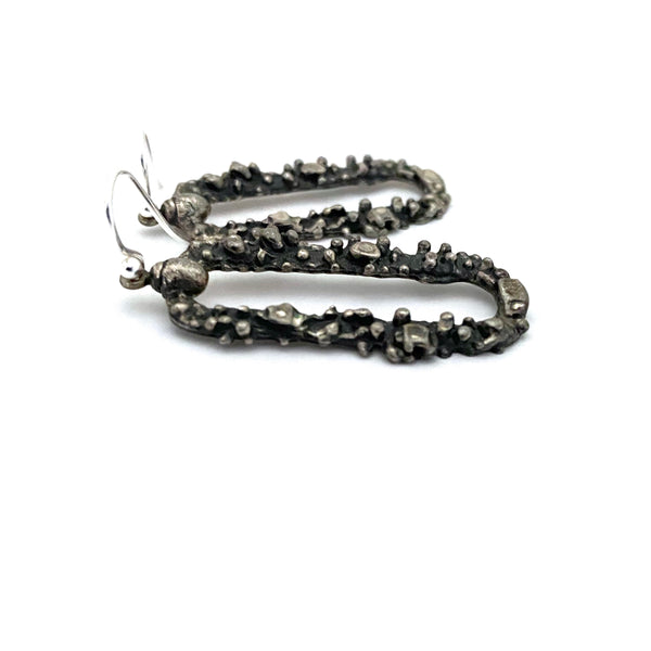 profile Guy Vidal Canada vintage brutalist pewter oval drop earrings Canadian Modernist jewelry design