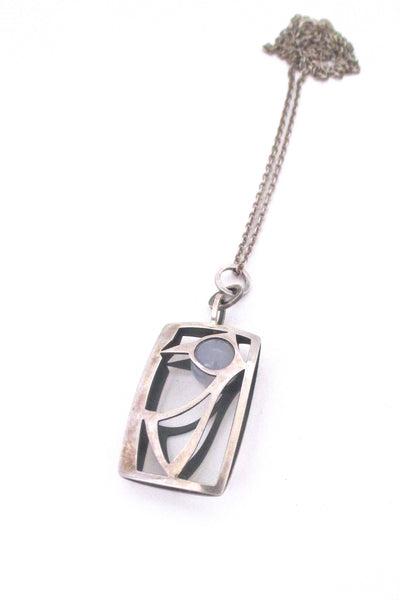 Elis Kauppi caged sphere bird pendant necklace
