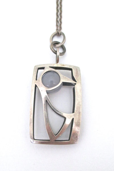 Elis Kauppi caged sphere bird pendant necklace