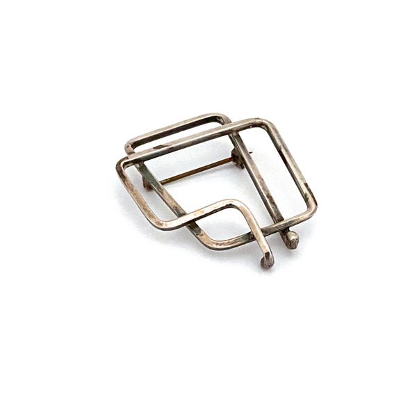 Joseph Skinger silver openwork brooch ~ hand wrought