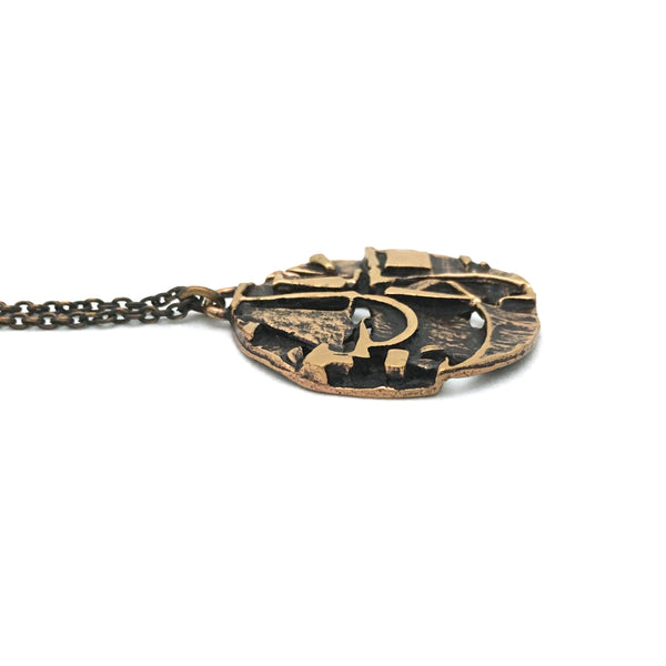 profile Jorma Laine Finland vintage textured bronze round pendant necklace Scandinavian Modern design jewelry