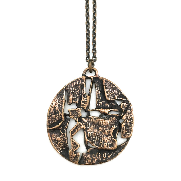 Jorma Laine textured bronze round pendant necklace
