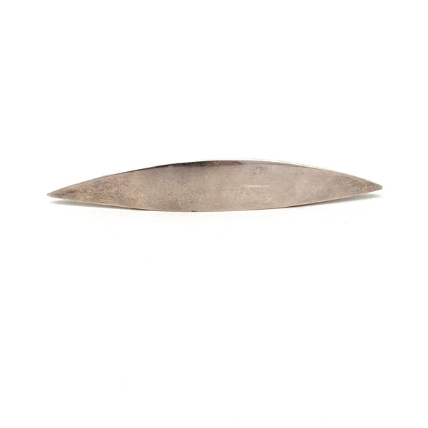 Marcin Zaremski long, sleek silver brooch