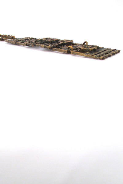 profile Pentti Sarpaneva Finland vintage brutalist bronze kinetic Pitsi pendant necklace