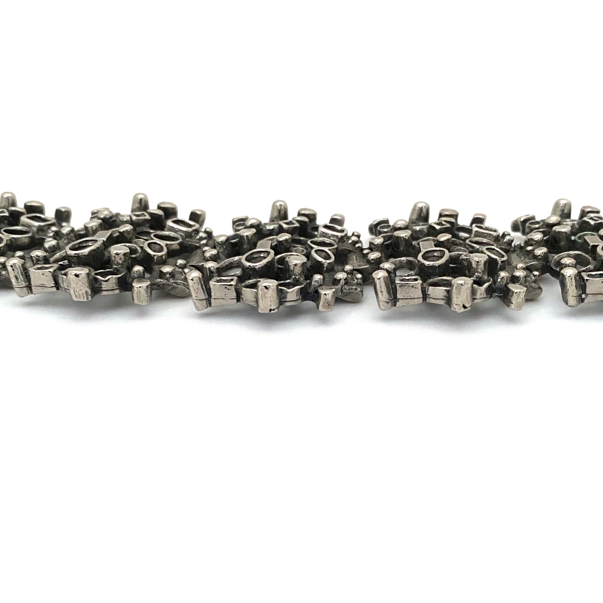 profile Robert Larin Canada vintage brutalist pewter extra wide lacy openwork panel link bracelet