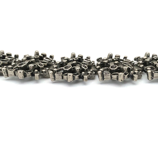 profile Robert Larin Canada vintage brutalist pewter extra wide lacy openwork panel link bracelet