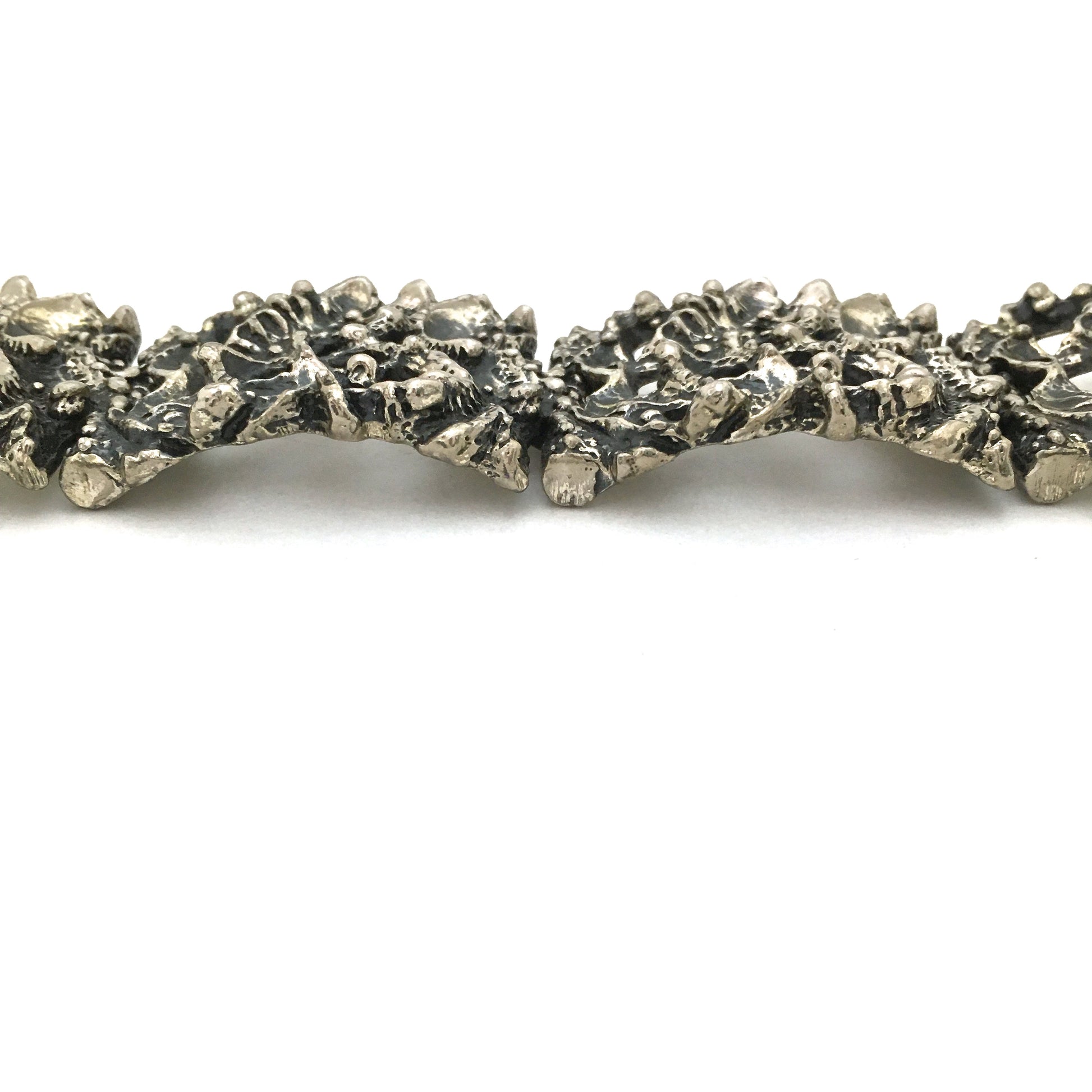 profile Robert Larin Canada vintage large brutalist pierced pewter link bracelet modernist jewelry design
