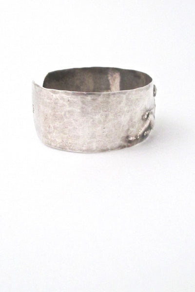 hammered silver repoussé nude cuff bracelet