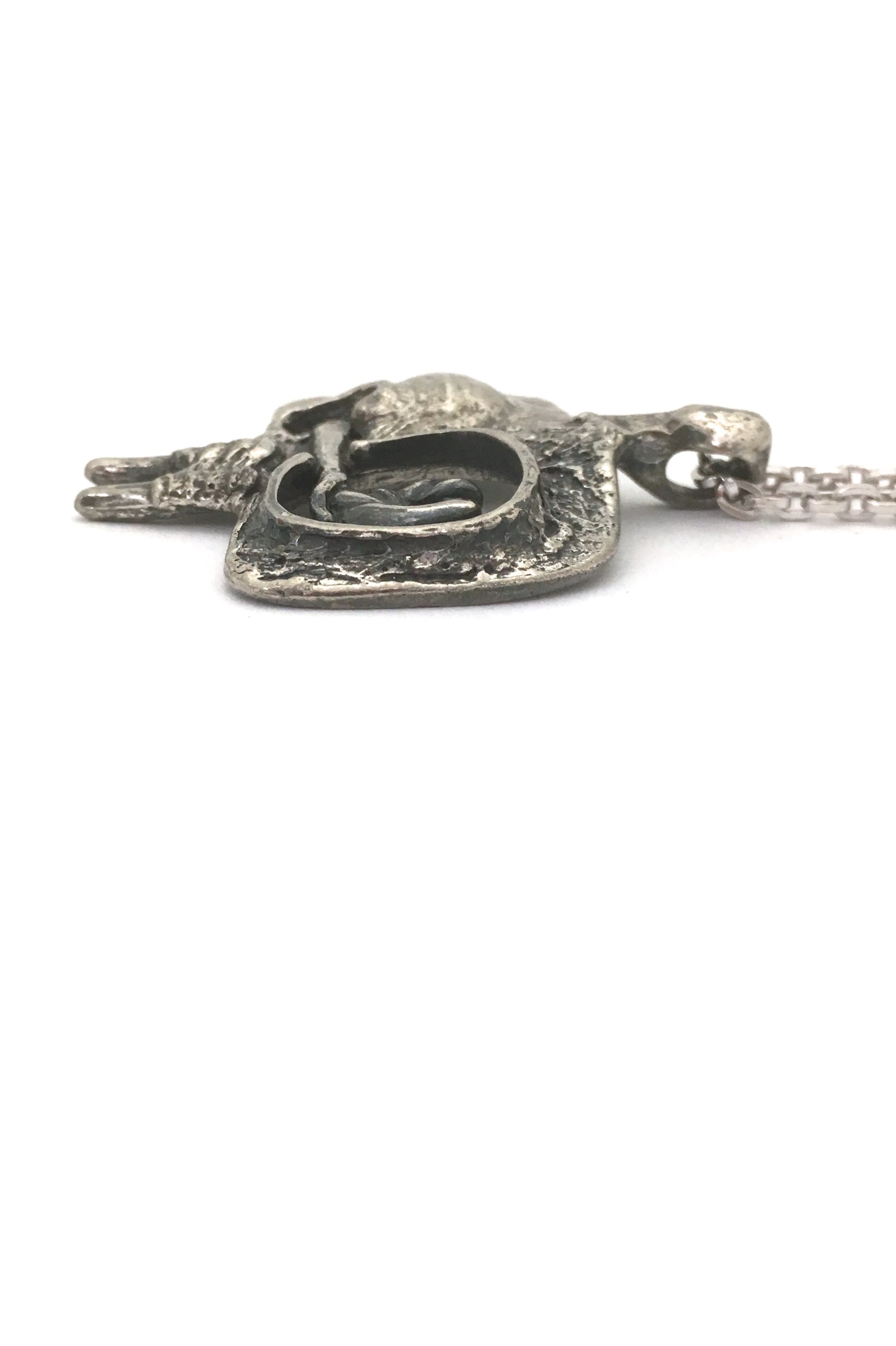 profile Guy Vidal Canada vintage brutalist pewter woman and bird pendant necklace bird in hand