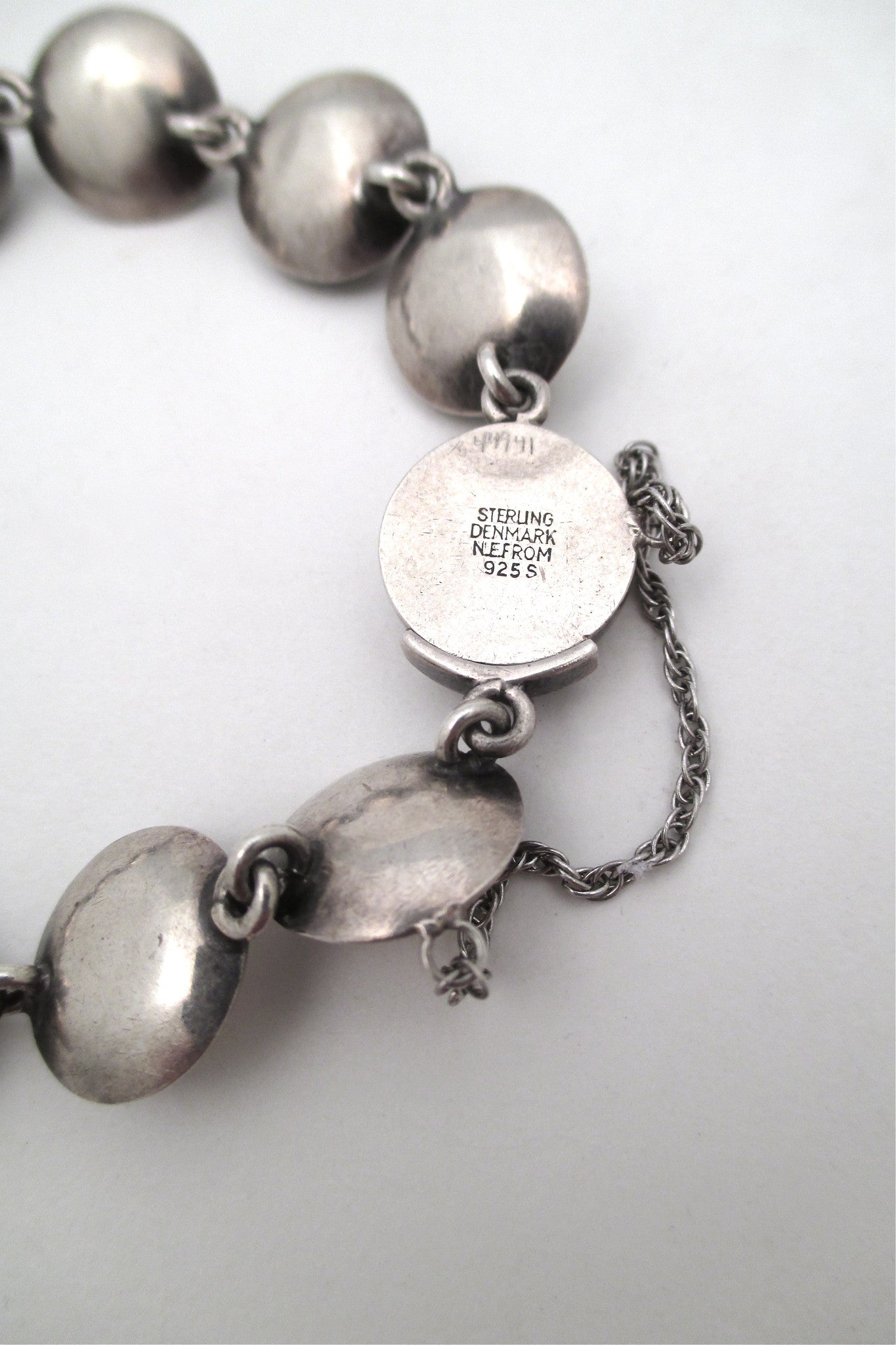 N E From 'silver cabochons' link bracelet
