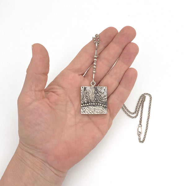 scale Jorma Laine Kultateollisuus Ky Finland vintage silver dimensional pendant necklace 1973 Scandinavian Modernist jewelry design