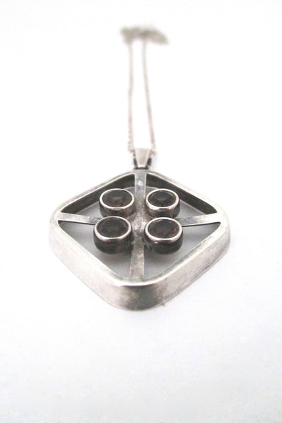 Salovaara four stone pendant necklace