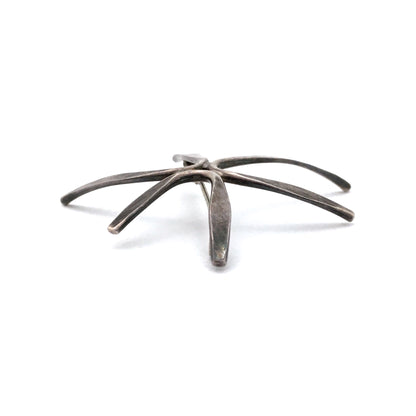 profile Christian Schmidt USA vintage Modernist silver starburst brooch mid century jewelry design