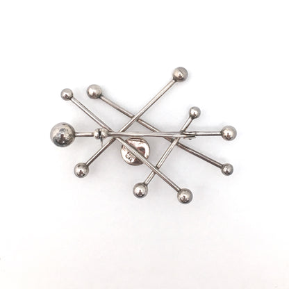 NE From large 'atomic' brooch with rose quartz