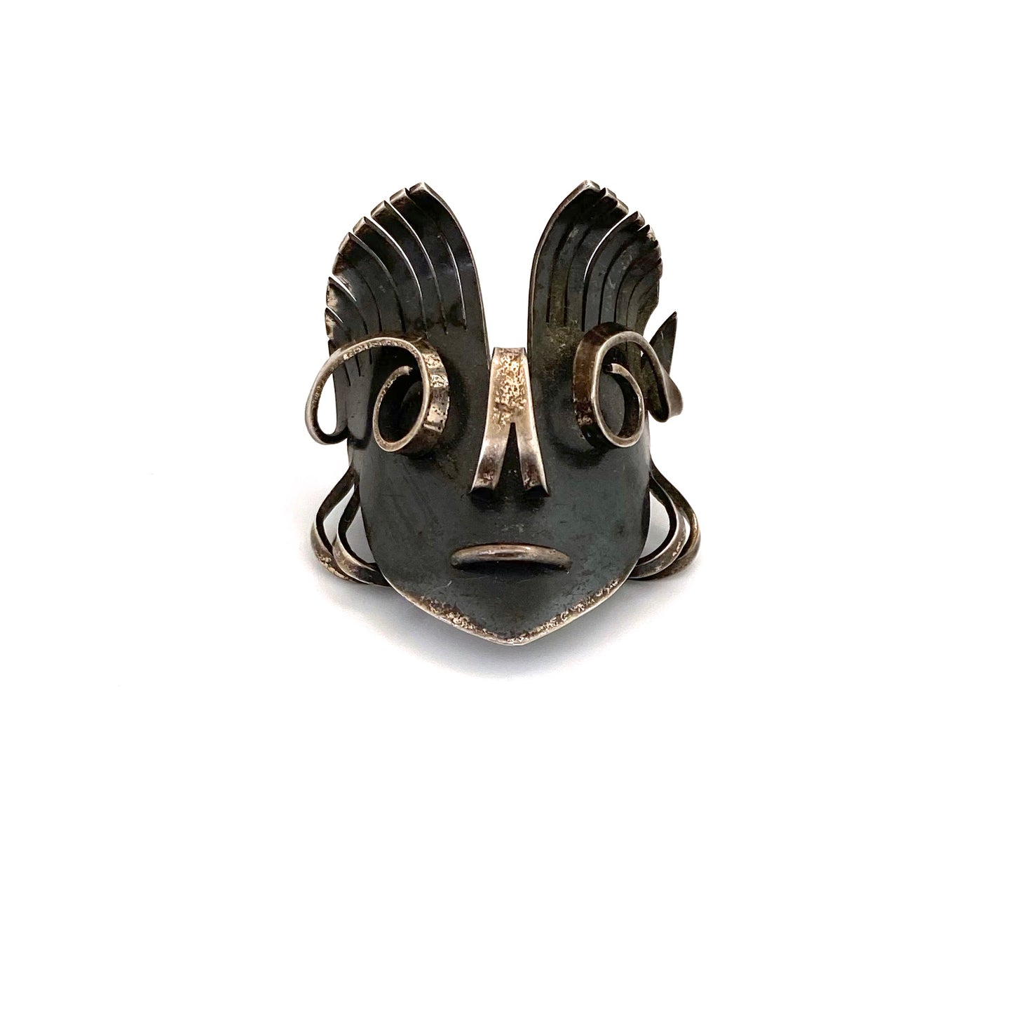 Modernist silver dimensional face mask brooch ~ Germany