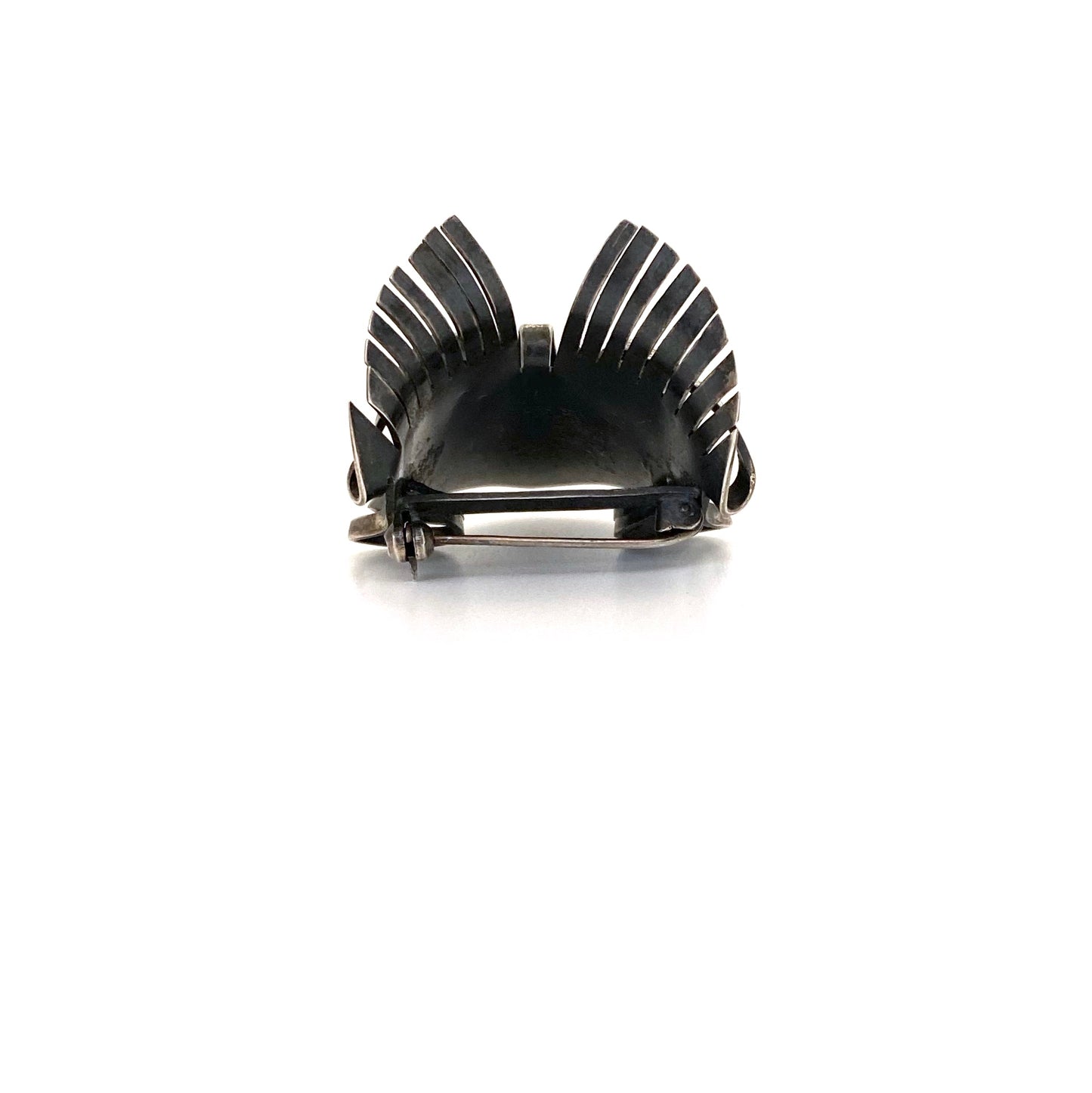 Modernist silver dimensional face mask brooch ~ Germany