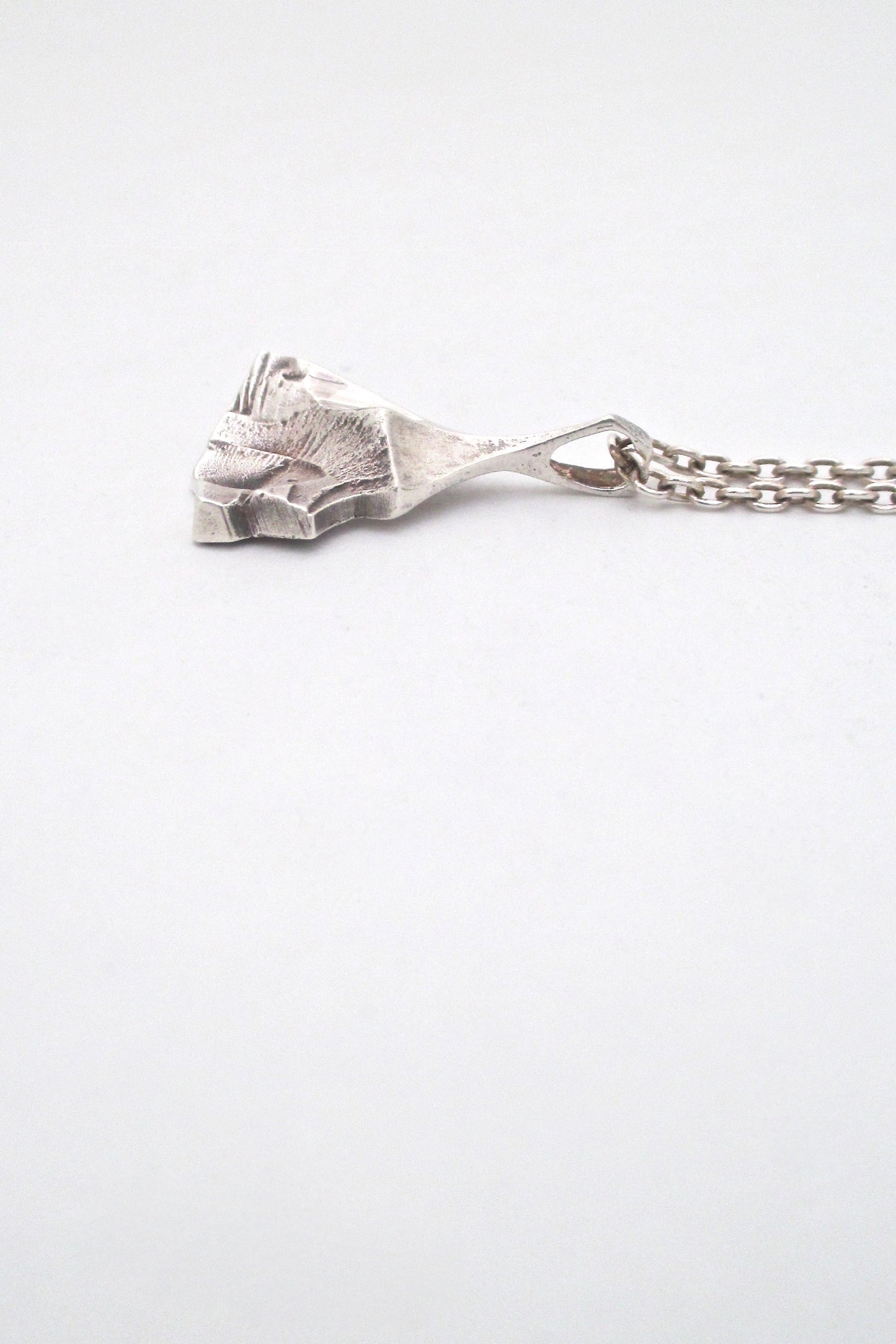 profile Matti Hyvarinen Finland vintage textural silver pendant necklace Scandinavian Modern jewelry design