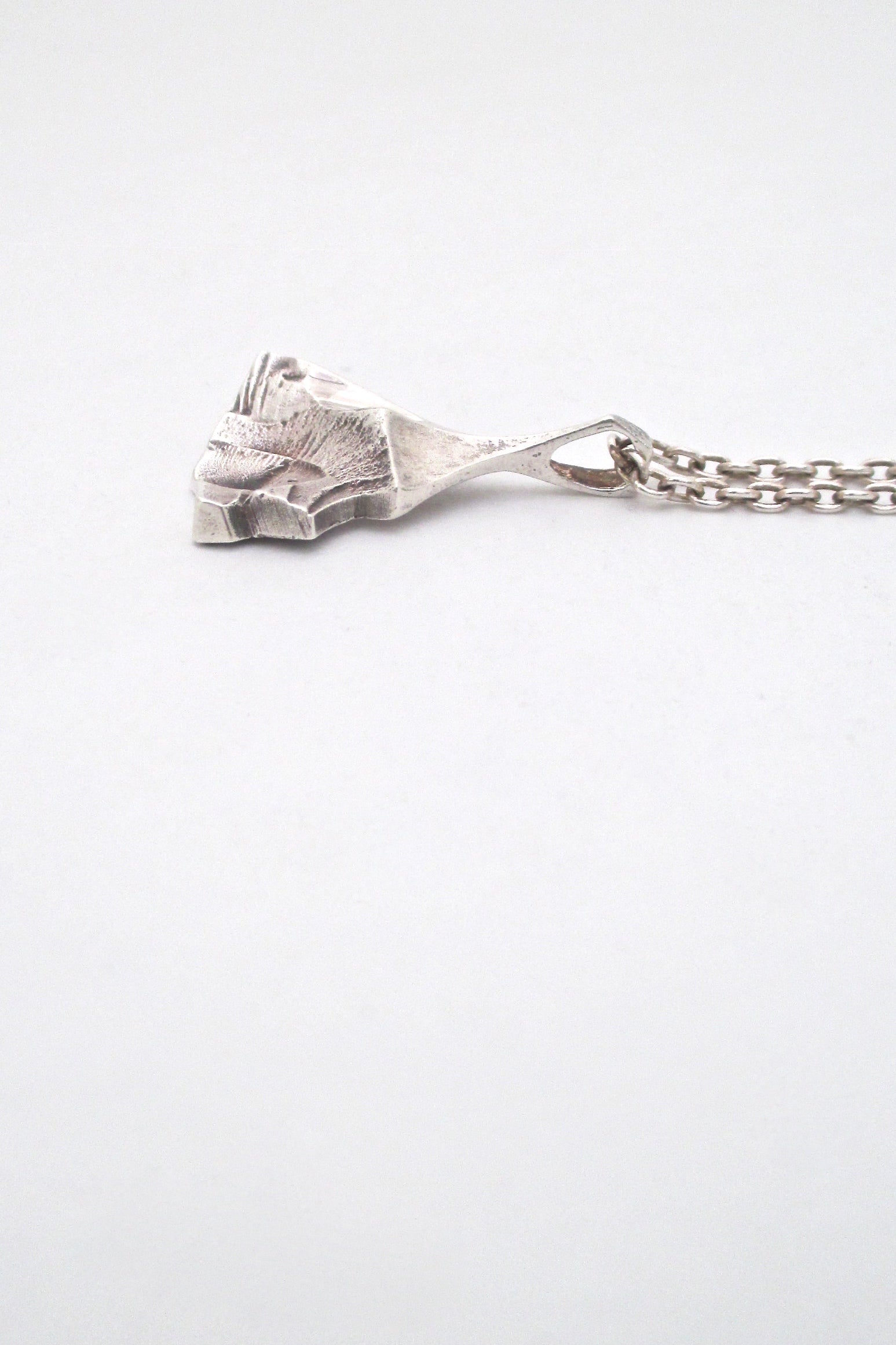profile Matti Hyvarinen Finland vintage textural silver pendant necklace Scandinavian Modern jewelry design