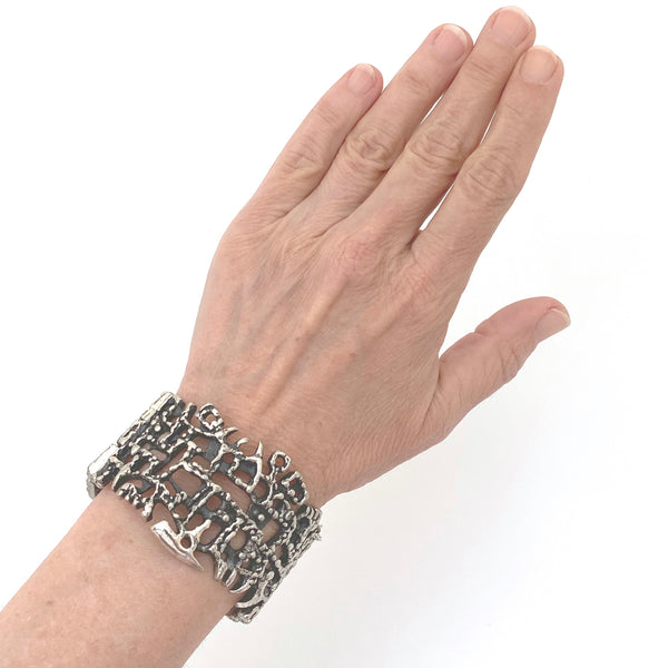 scale Guy Vidal Canada vintage brutalist pewter openwork hinged bracelet Canadian Modernist jewelry design