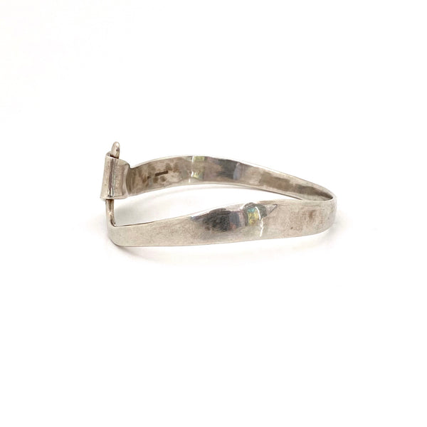 profile vintage hand wrought hammered silver hook bangle bracelet Modernist jewelry design