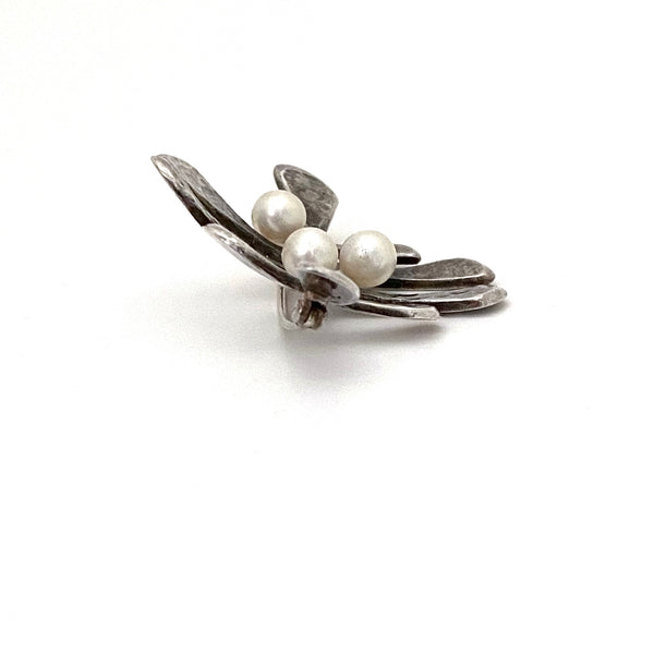 profile Walter Schluep Hans Gehrig Canada vintage brutalist hammered silver and pearl brooch Canadian Modernist jewelry design