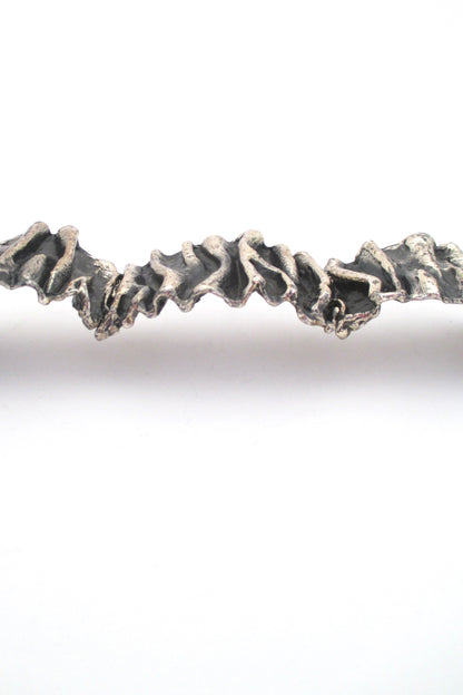 profile Guy Vidal Canada large brutalist pewter gathered folds hinged bracelet