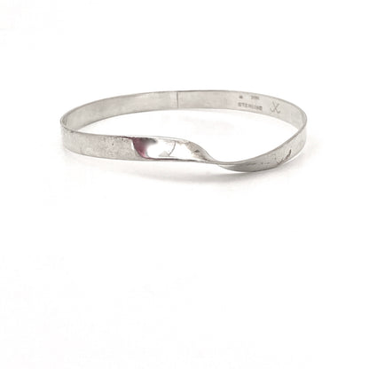 profile John Lewis USA vintage silver twisted bangle bracelet 1976 Modernist jewelry design
