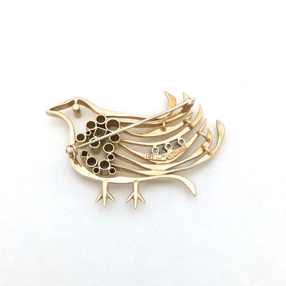 Walter Schluep 18k & diamond bird brooch