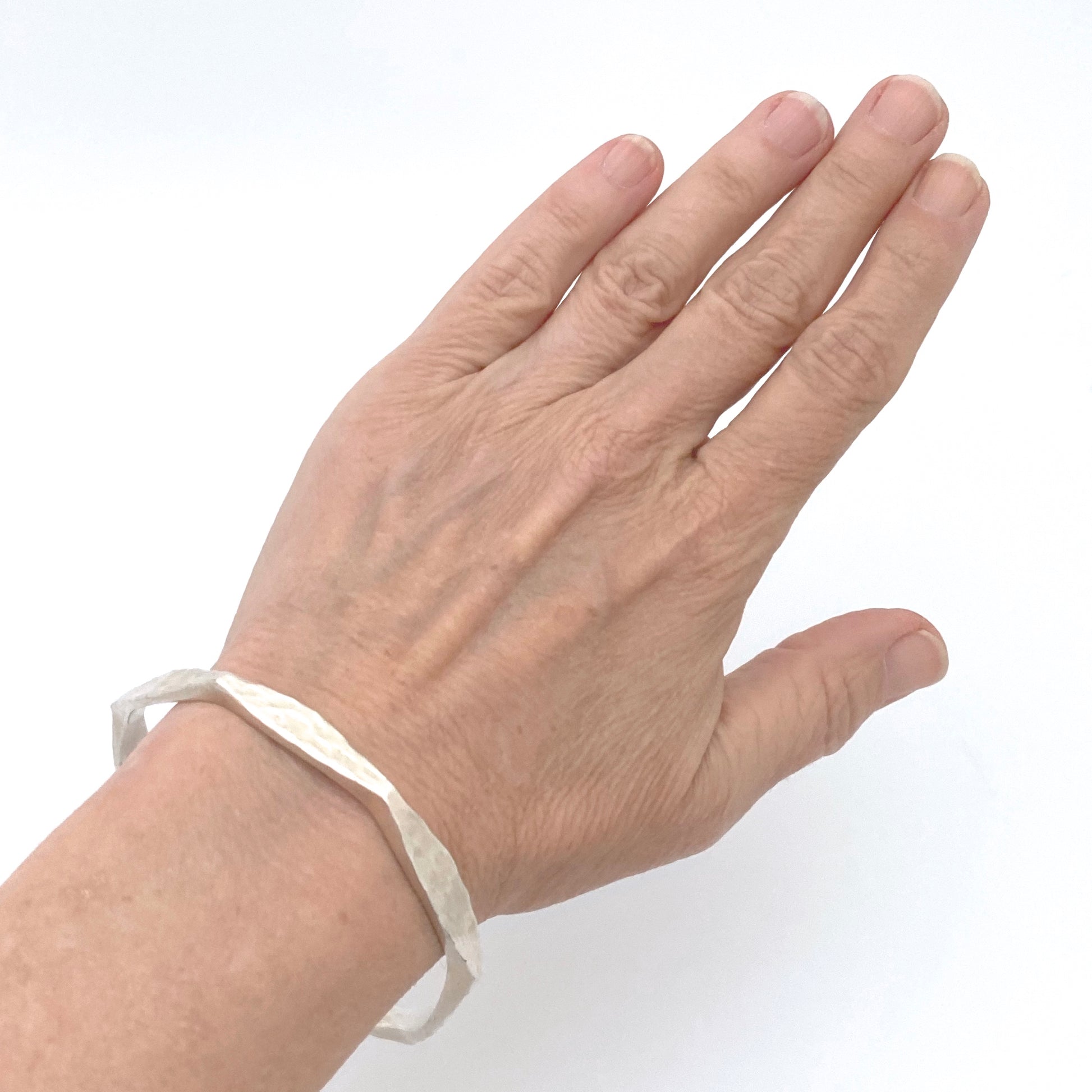 scale Hattie Carnegie USA vintage hammered silver plate bangle bracelet Modernist jewelry design
