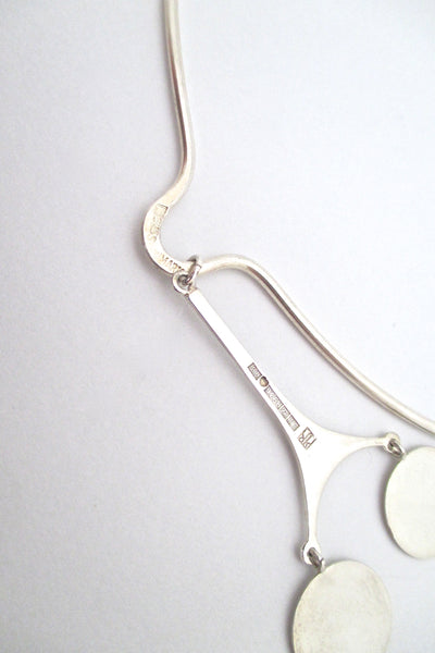 Kaunis Koru kinetic silver pendant