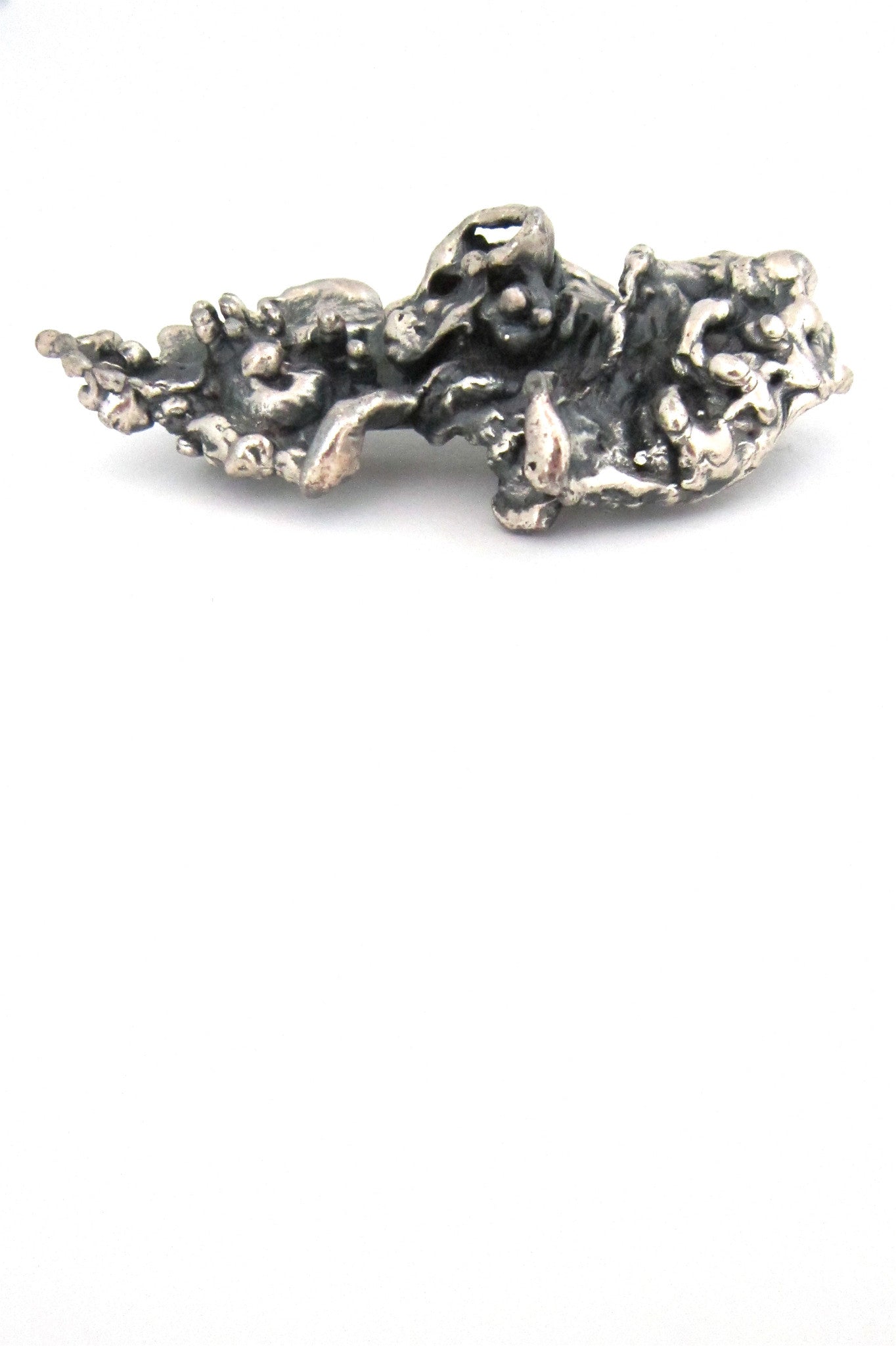Guy Vidal large, deeply textured brooch