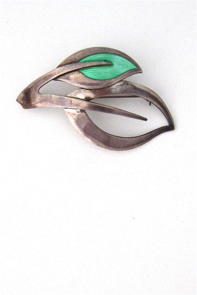 N E From enamelled leaves brooch