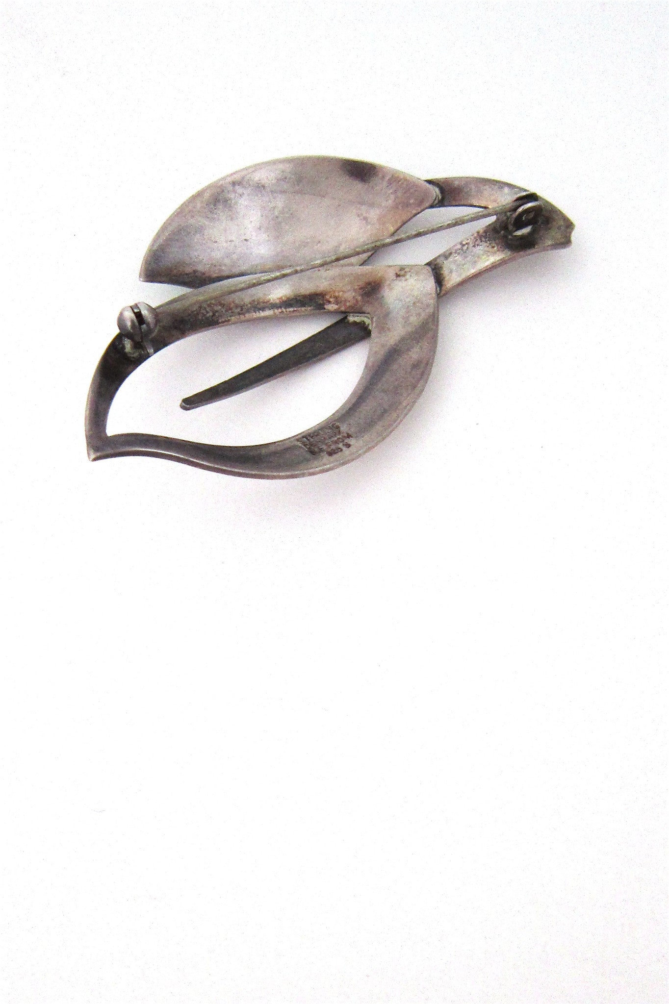 N E From enamelled leaves brooch