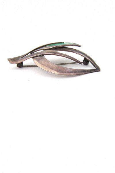 N E From enamelled leaves brooch