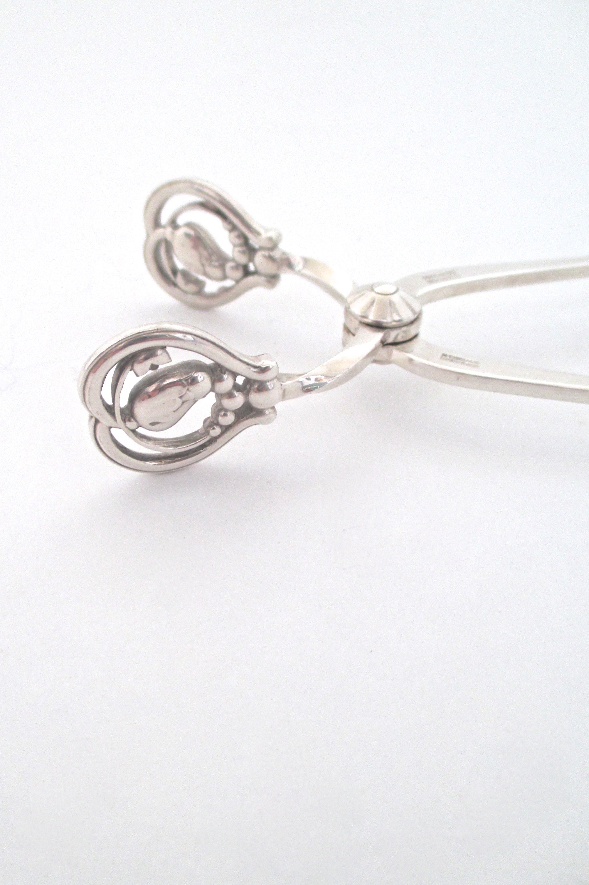 detail Georg Jensen and Wendell Denmark vintage sterling silver Blossom tongs 1945-1951