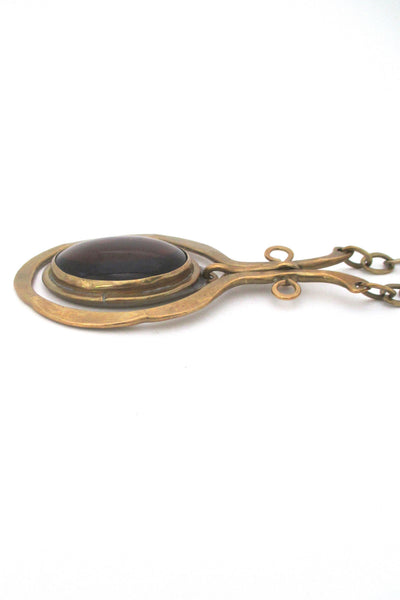 profile Rafael Alfandary Canada large vintage brutalist brass and glass dark amber kinetic necklace