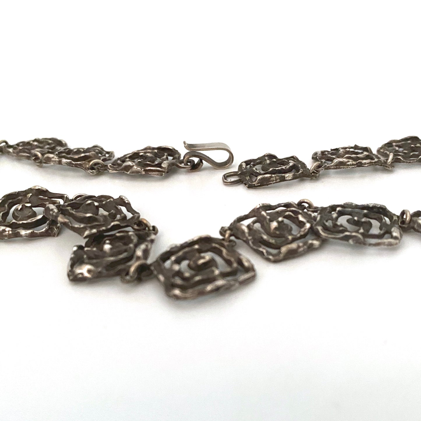 vintage brutalist openwork cast silver necklace