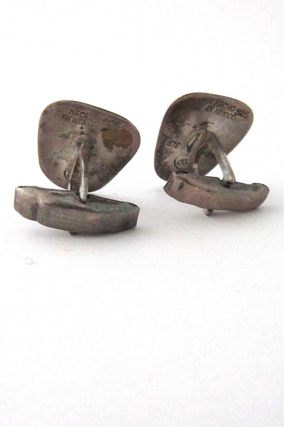 Taxco masks cuff links
