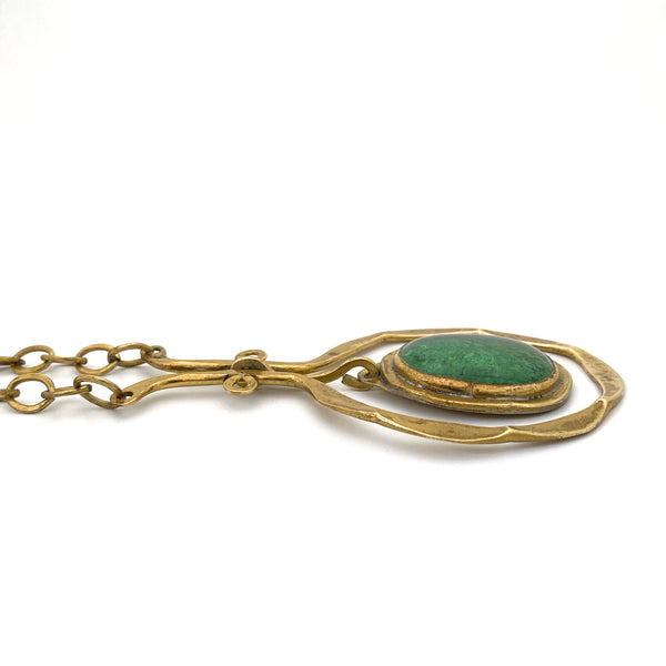 profile Rafael Alfandary Canada vintage brass classic kinetic pendant necklace clear green glass stone