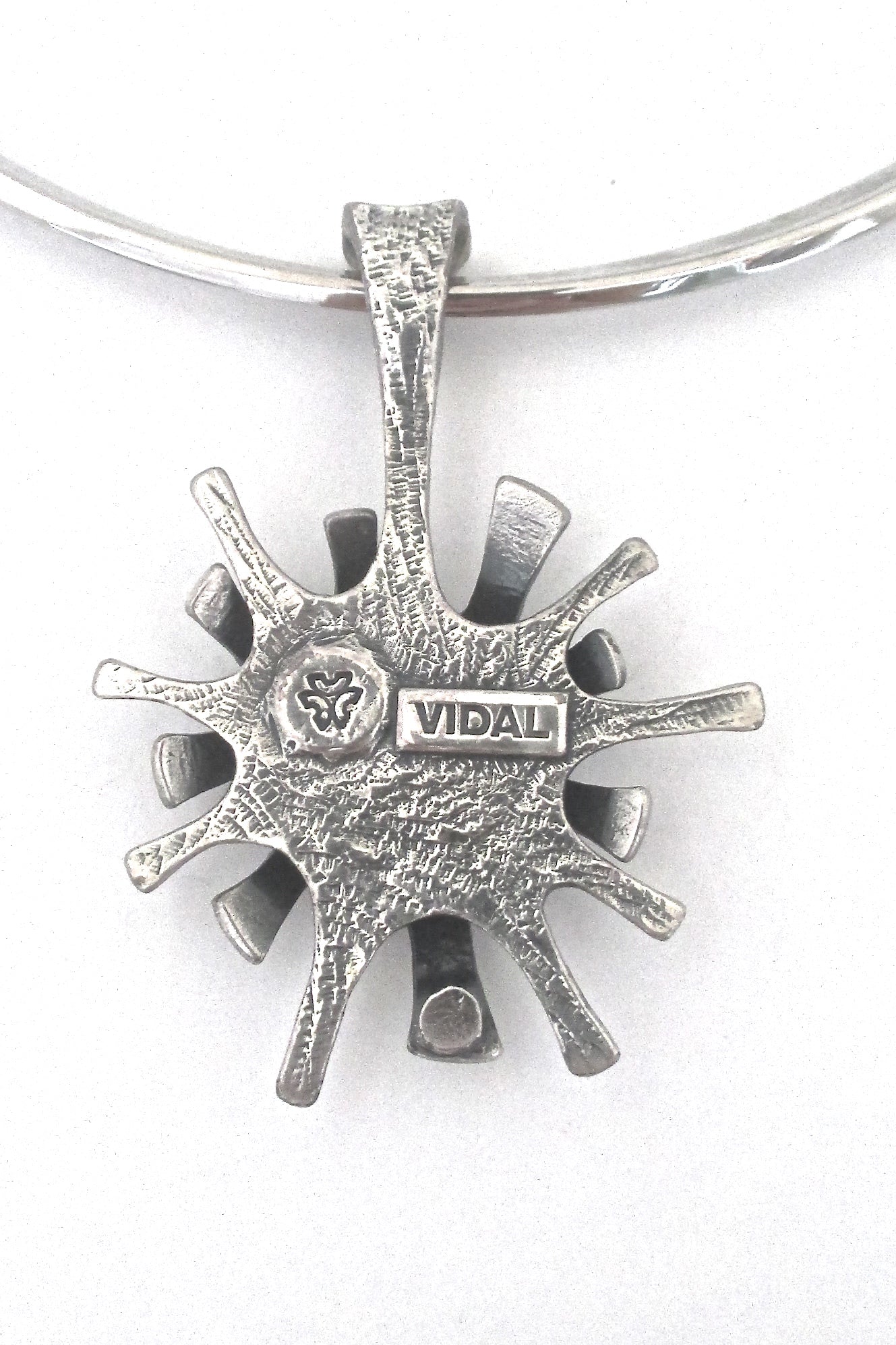 Guy Vidal layered starburst pendant & choker