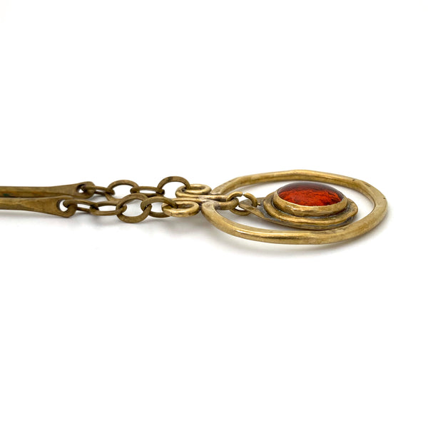 profile Rafael Alfandary Canada vintage brass clear amber glass kinetic pendant necklace