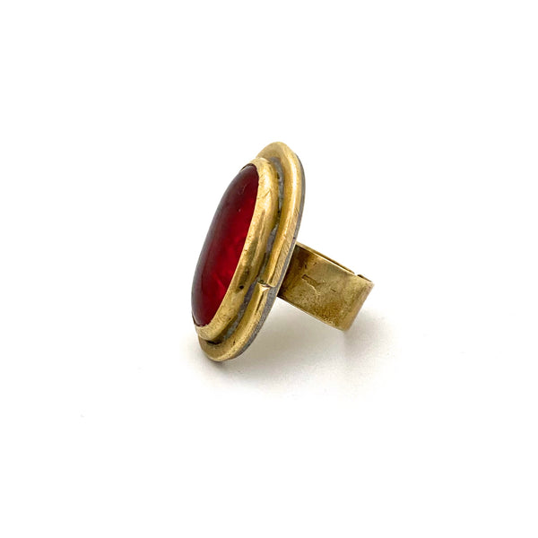 profile Rafael Alfandary Canada vintage brutalist brass oval ring clear red glass