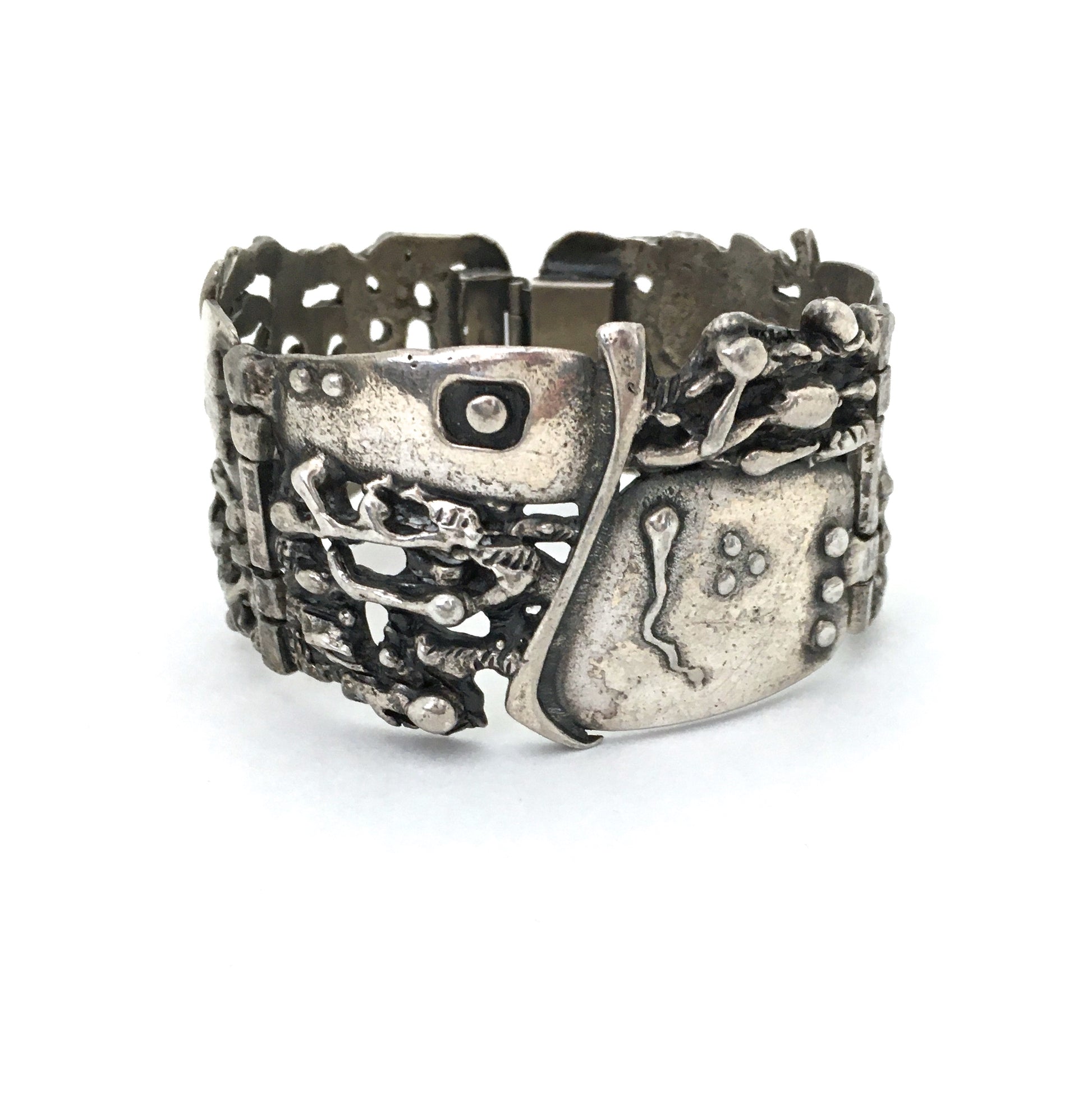 detail Guy Vidal Canada vintage brutalist pewter hinged panel link bracelet Fertility pattern Canadian design art sculpture