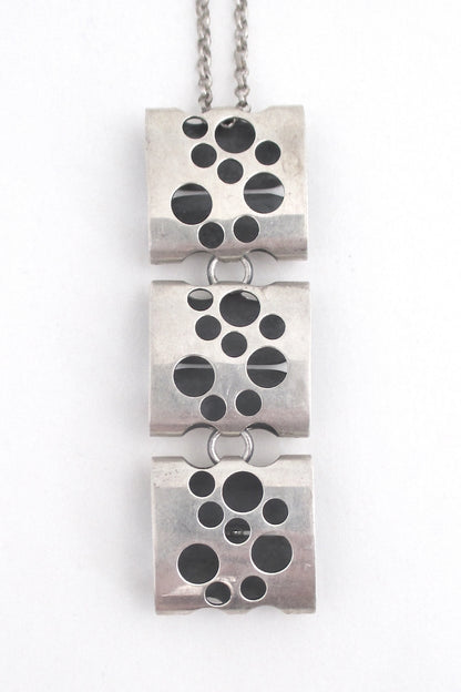 Elis Kauppi for Kupittaan Kulta long kinetic silver pendant