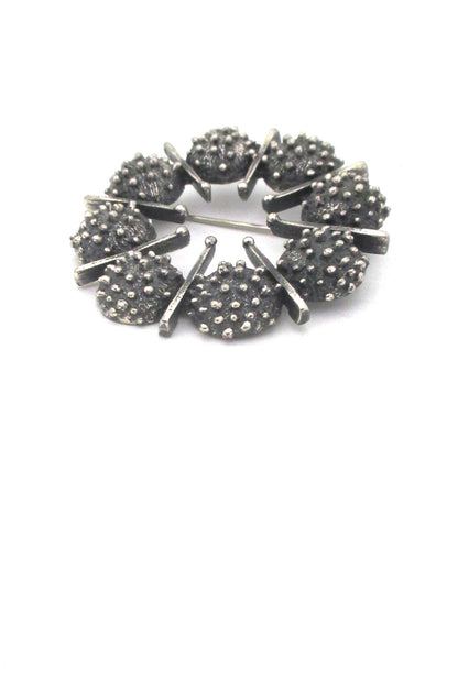 Guy Vidal openwork round pewter brooch