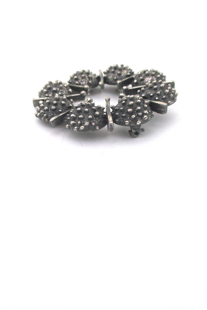 profile Guy Vidal Canada vintage brutalist pewter round openwork brooch