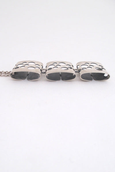 profile Elis Kauppi for Kupittaan Kulta long kinetic pierced silver pendant necklace